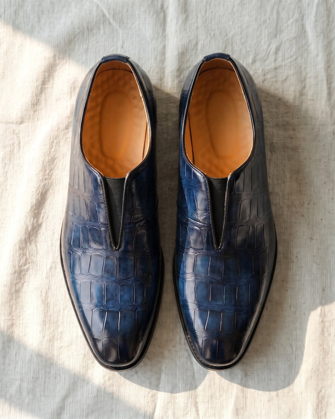 Denton - Patinierte Slip-on-Loafer mit Kroko-Prägung