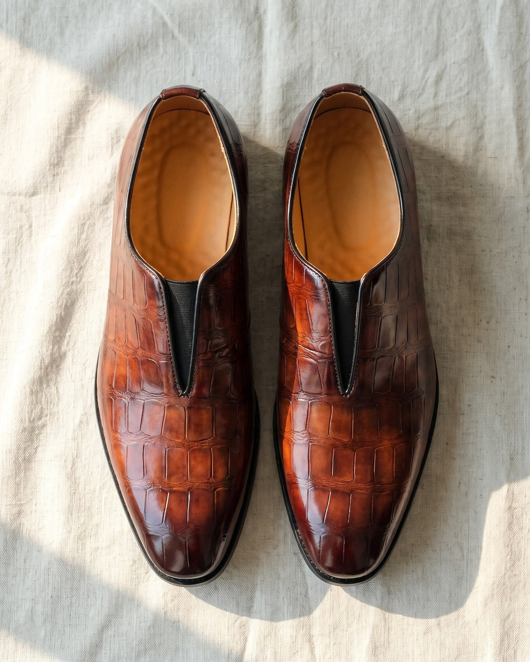 Denton - Patinierte Slip-on-Loafer mit Kroko-Prägung