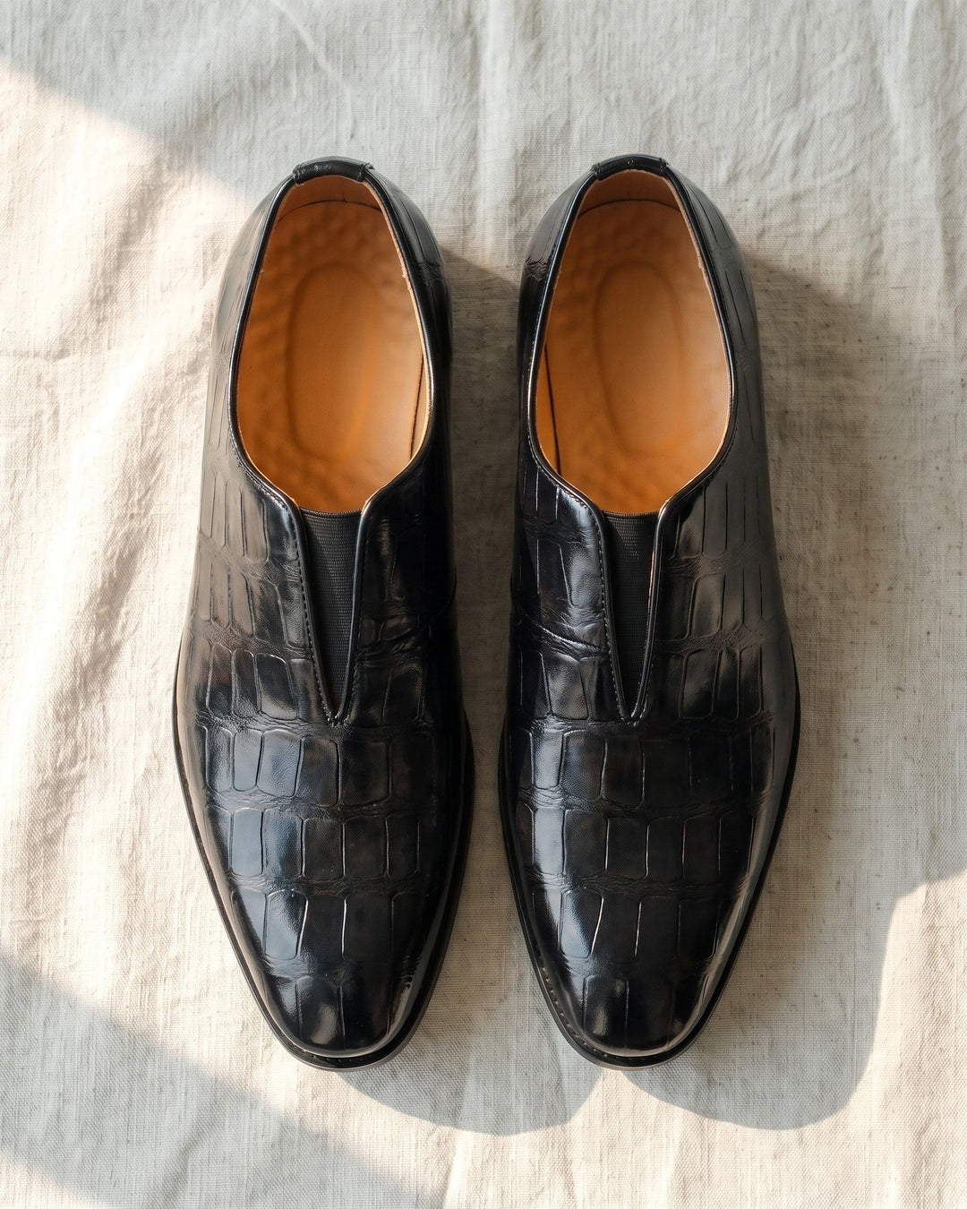 Denton - Patinierte Slip-on-Loafer mit Kroko-Prägung